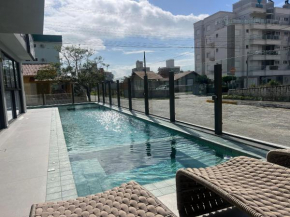 Piscina no condominio! Apto na praia de Palmas